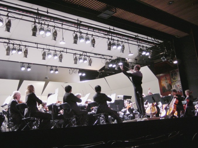 George conducting Nova Vista Symphony (wide shot)